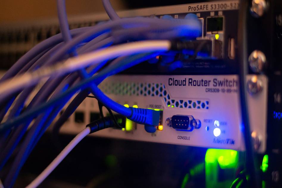 Abstract network nodes representing streaming protocol data flow on dark blue background